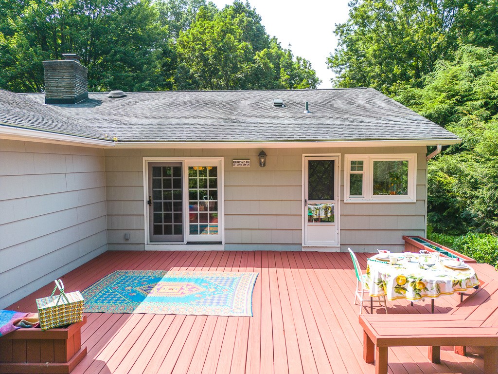 4 Tuxford Road Pittsford, NY 14534 - Photo 35 of 38 The door from the kitchen makes it easy to enterta