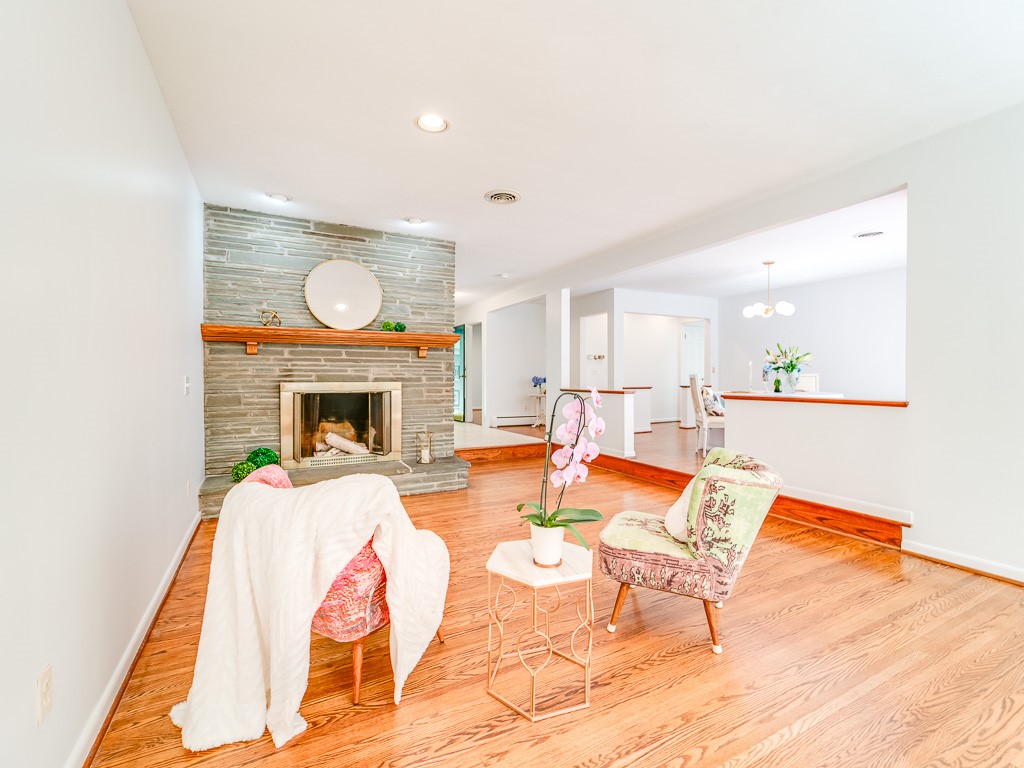 4 Tuxford Road Pittsford, NY 14534 - Photo 10 of 38 The wood burning ledge rock fireplace in the livin