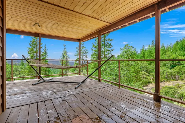 a park with wooden stairs and a table