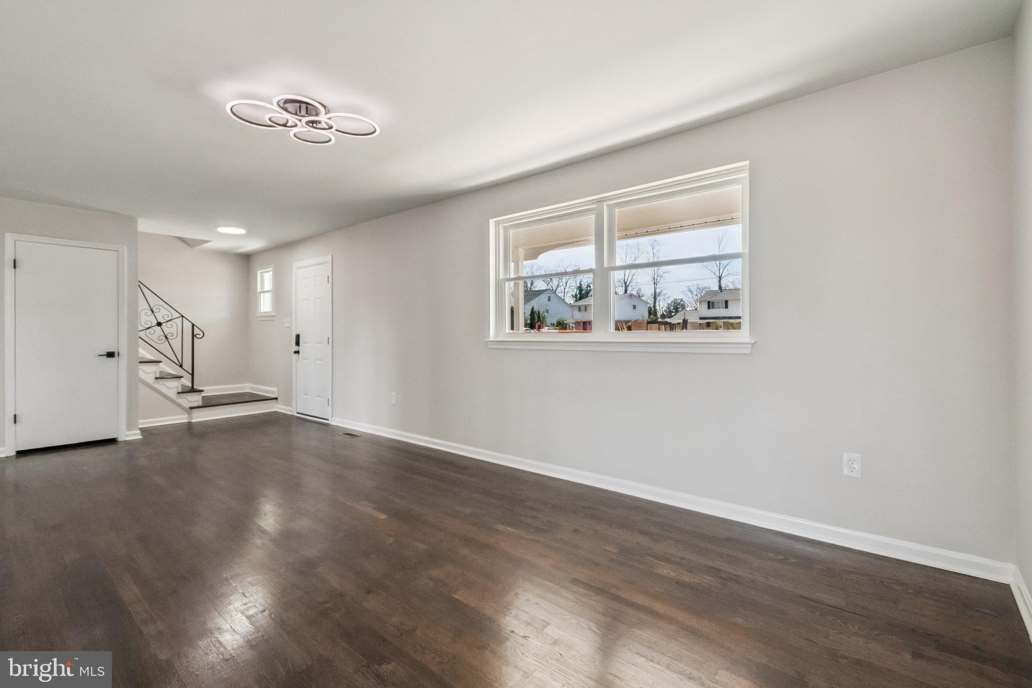6815 Rolling Road Springfield, VA 22152 - Photo 23 of 40 a view of empty room with wooden floor