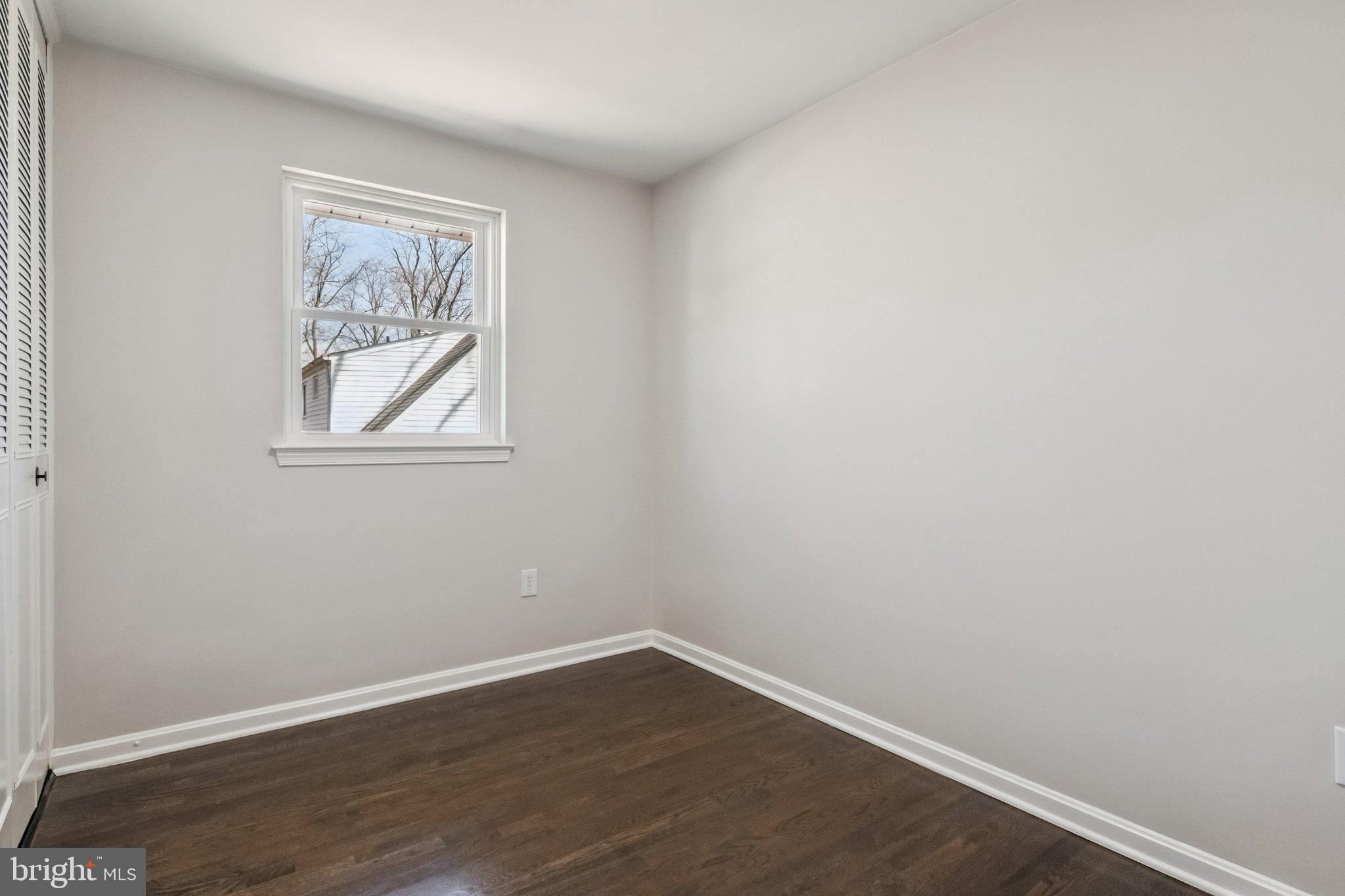 6815 Rolling Road Springfield, VA 22152 - Photo 33 of 40 an empty room with a window