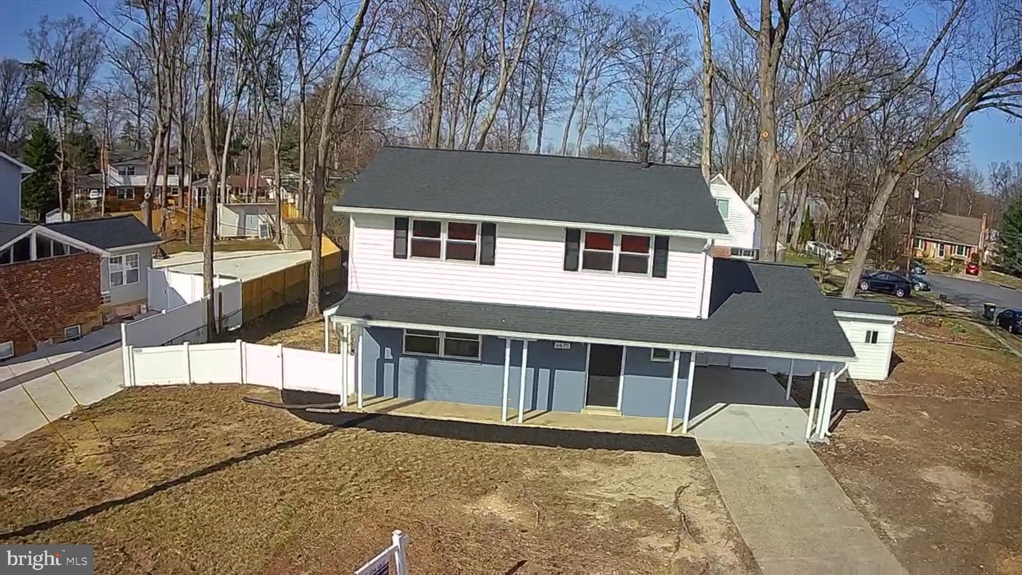 6815 Rolling Road Springfield, VA 22152 - Photo 7 of 40 a house view with a outdoor space