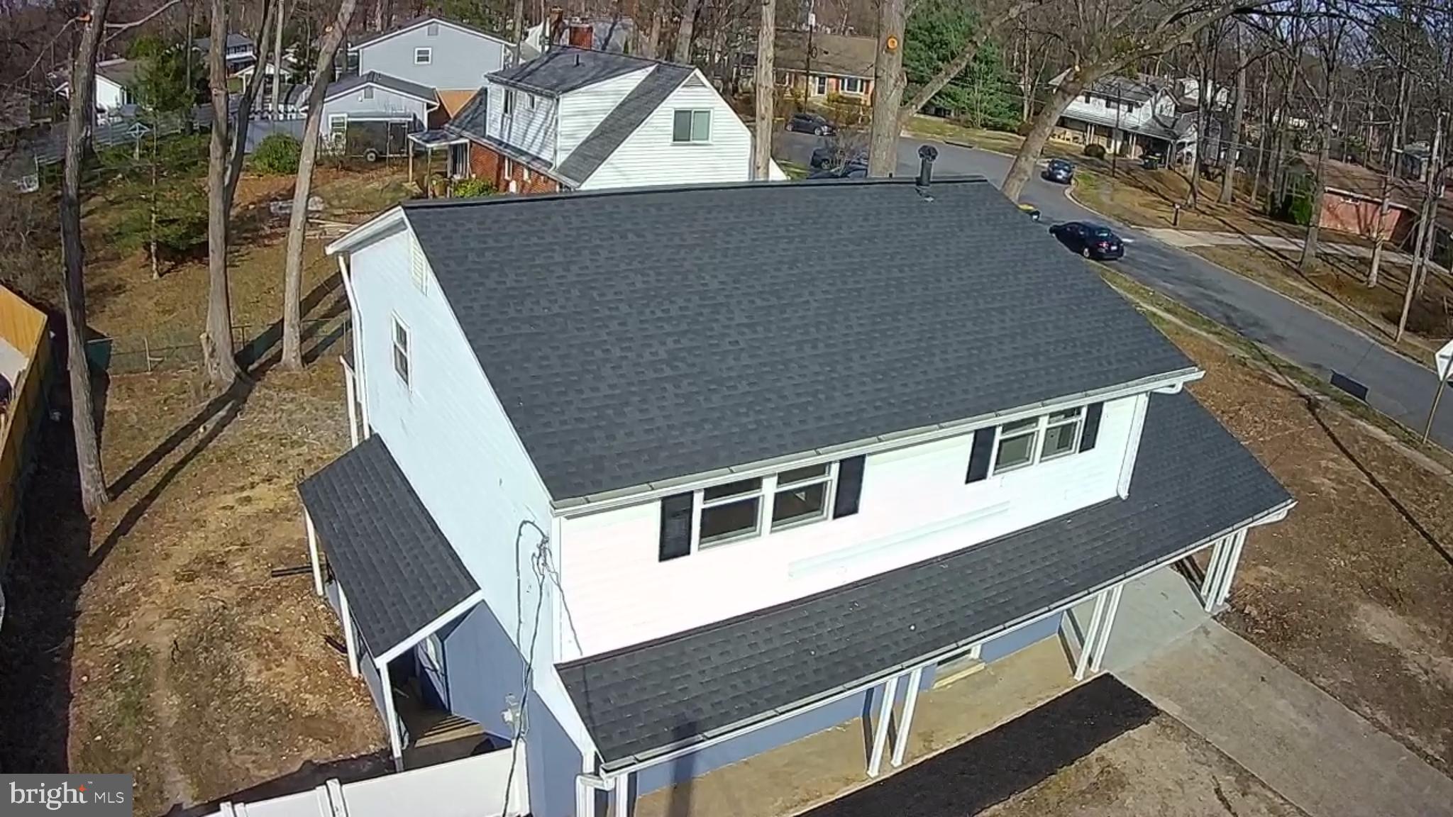 6815 Rolling Road Springfield, VA 22152 - Photo 8 of 40 a aerial view of a house with a yard