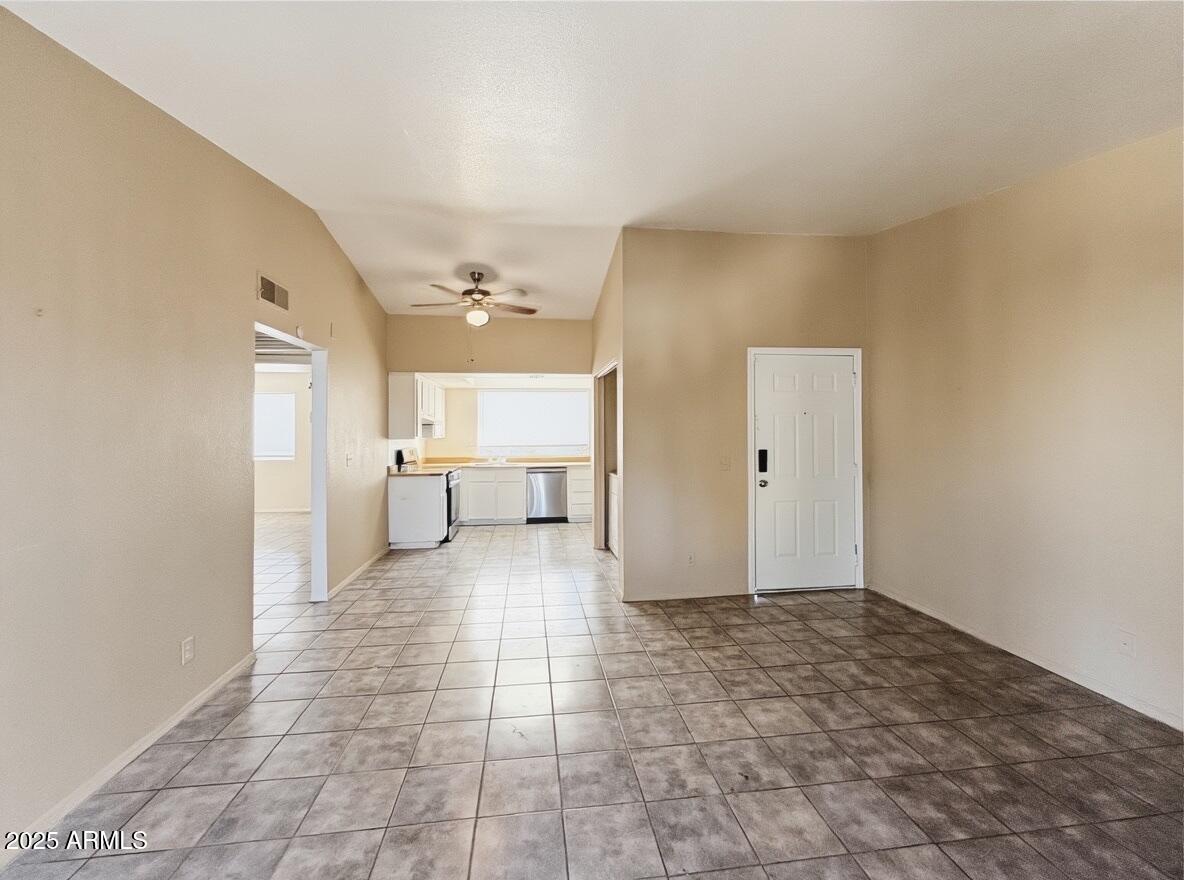 10820 North 16th Avenue, Unit 4 Phoenix, AZ 85029 - Photo 5 of 11 a view of a big room with closet and windows