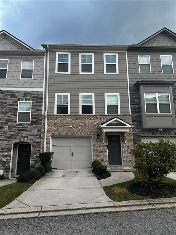 a front view of a house with yard