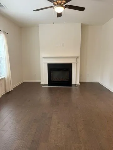 an empty room with a fireplace
