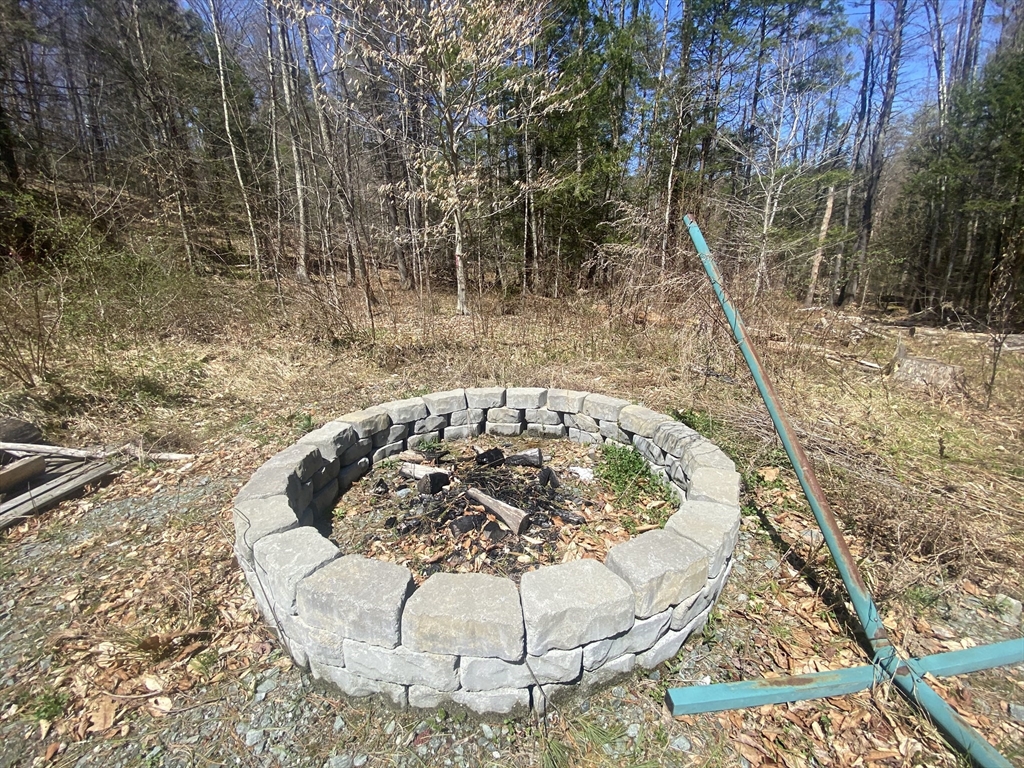 0 Schaefer Way Charlemont, MA 01339 - Photo 8 of 16 a view of a swimming pool with a sitting space