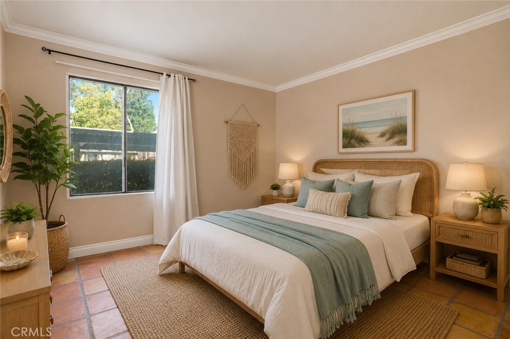 20702 El Toro Road, Unit 231 Lake Forest, CA 92630 - Photo 5 of 36 a bedroom with a large bed and a potted plant