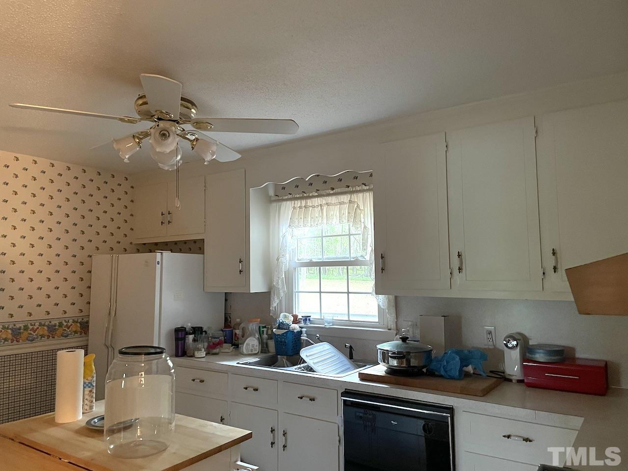 401 Andover Road Durham, NC 27712 - Photo 12 of 15 a kitchen with a sink cabinets and window