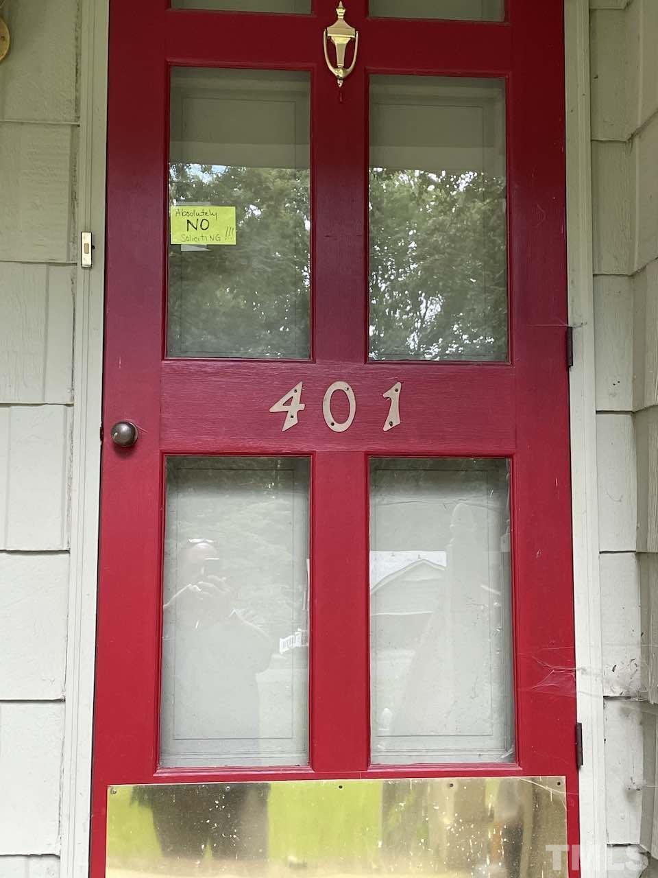 401 Andover Road Durham, NC 27712 - Photo 5 of 15 a view of a red door of the house
