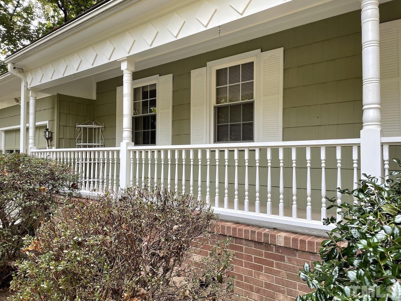 401 Andover Road Durham, NC 27712 - Photo 6 of 15 front view of a brick house with a large window
