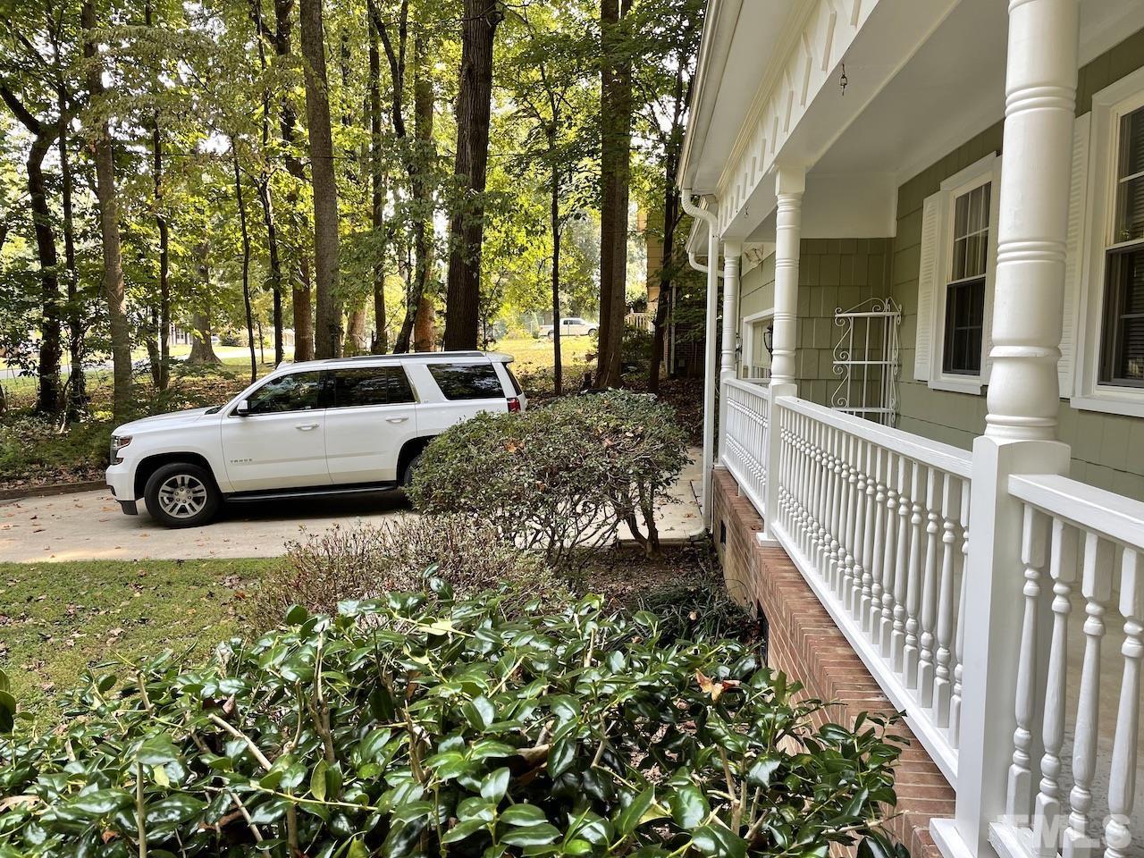 401 Andover Road Durham, NC 27712 - Photo 8 of 15 a view of a car park in front of a house
