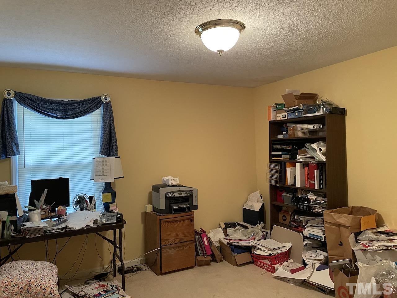 401 Andover Road Durham, NC 27712 - Photo 9 of 15 a room with furniture and gym equipment