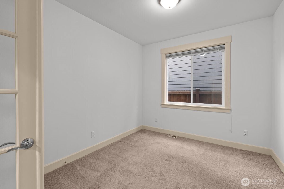 603 194th Place Southeast Bothell, WA 98012 - Photo 16 of 30 a view of an empty room with a window