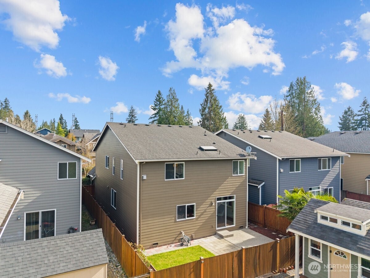 603 194th Place Southeast Bothell, WA 98012 - Photo 27 of 30 a aerial view of a house with yard and balcony