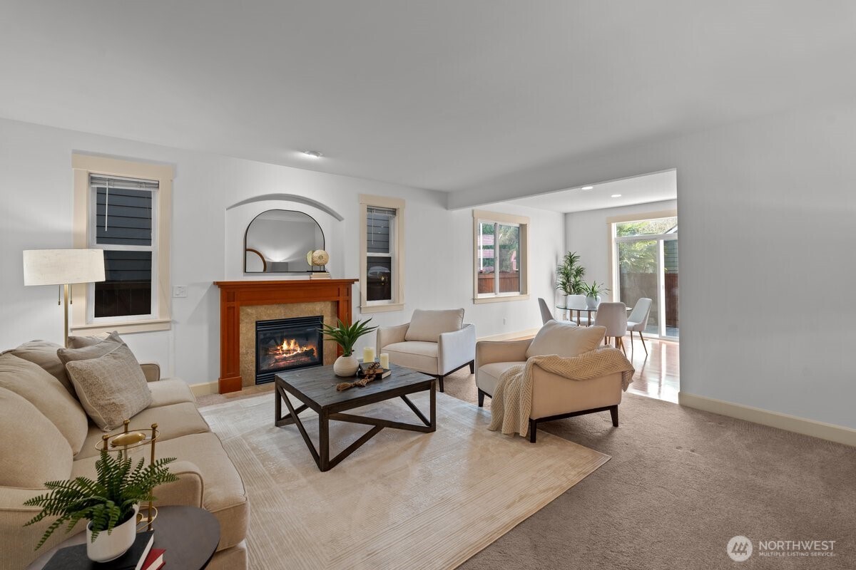 603 194th Place Southeast Bothell, WA 98012 - Photo 6 of 30 a living room with furniture and a fireplace