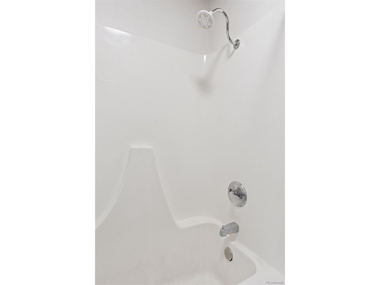 16880 Old Pueblo Road Fountain, CO 80817 - Photo 15 of 49 En-suite bathroom shower and tub combination serving the adjacent bedroom
