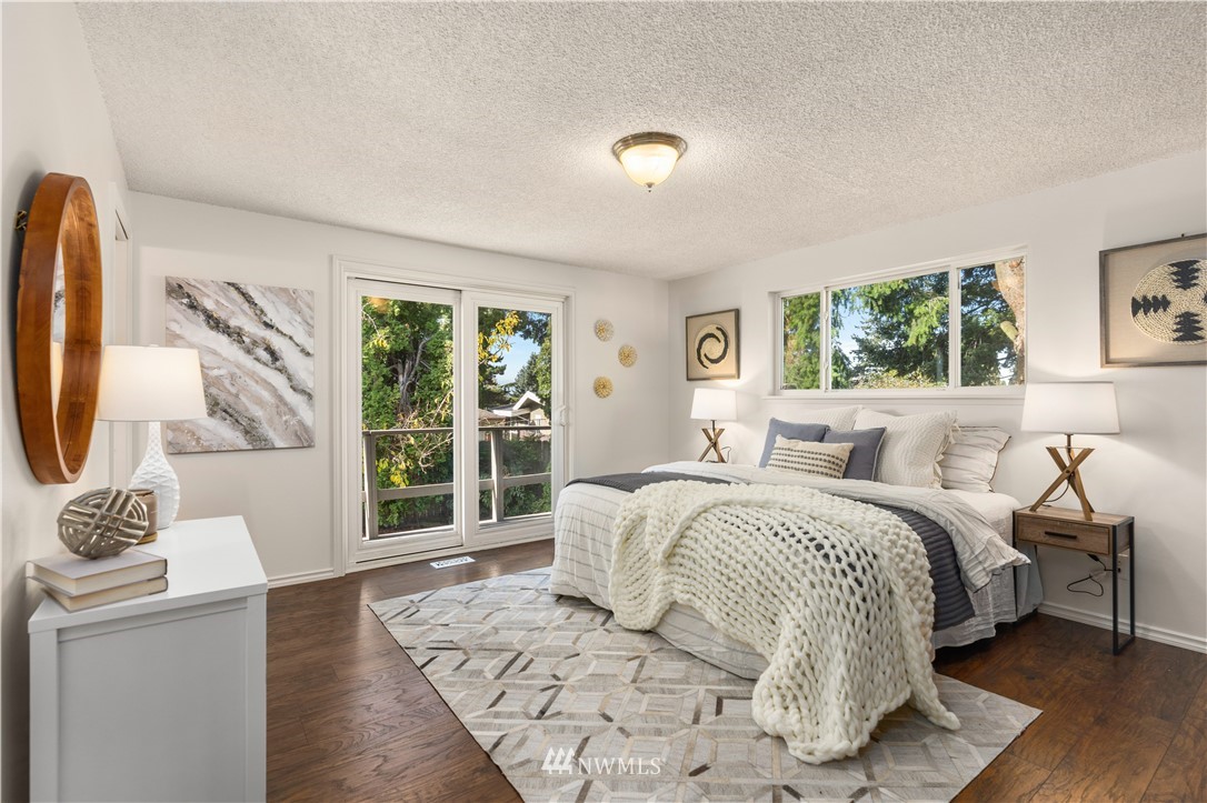 451 Index Avenue Northeast Renton, WA 98056 - Photo 14 of 30 a bed room with a bed and a window