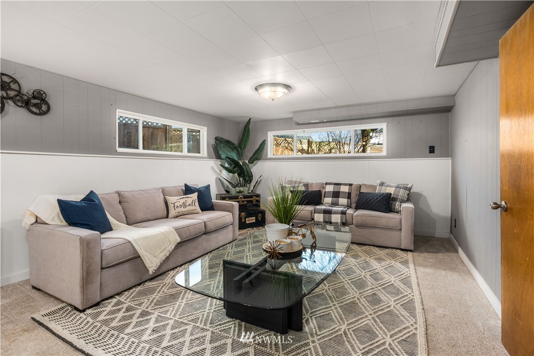 451 Index Avenue Northeast Renton, WA 98056 - Photo 22 of 30 a living room with furniture and a rug