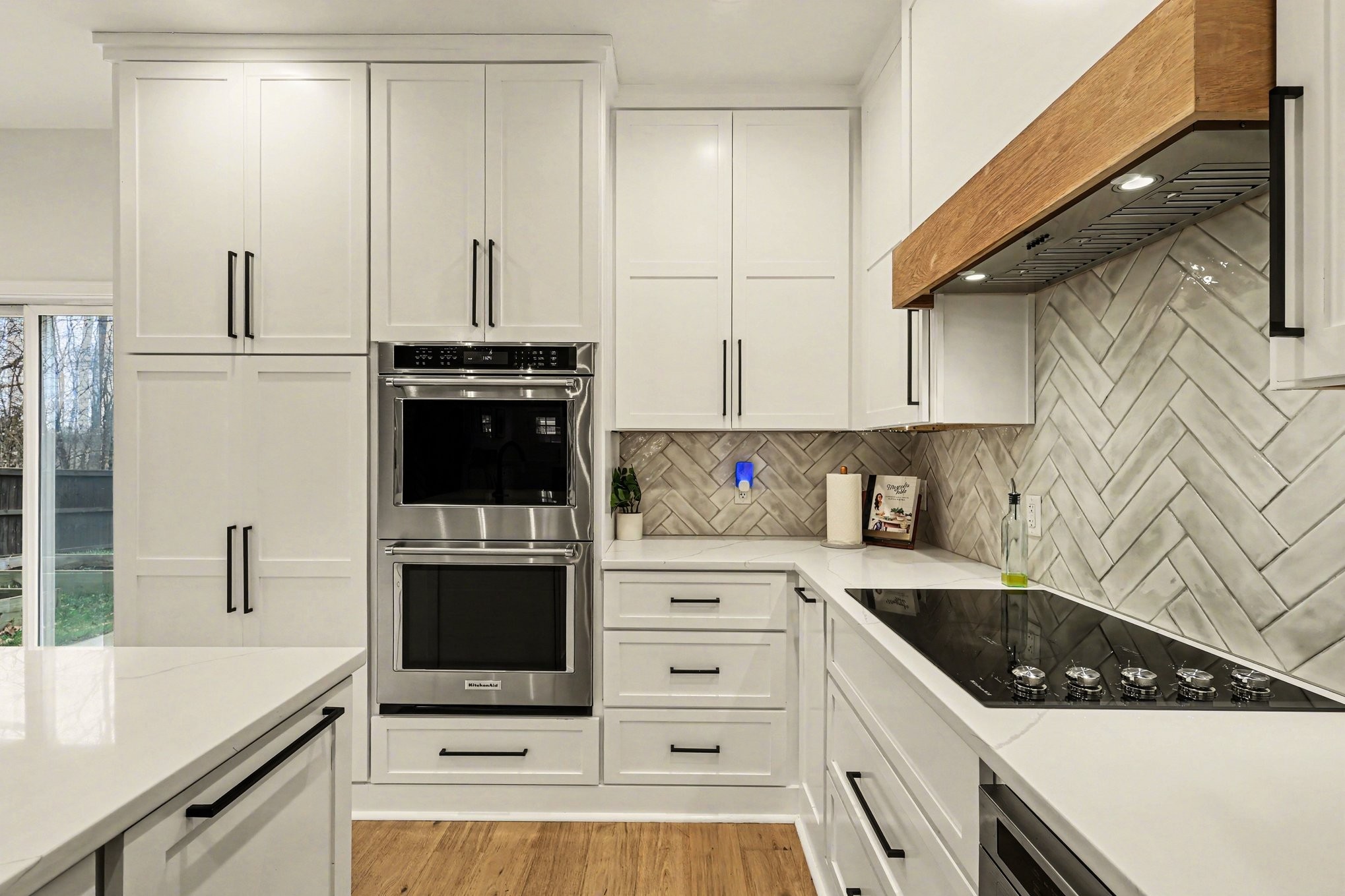 744 Bench Lane Mount Juliet, TN 37122 - Photo 7 of 27 a kitchen with stainless steel appliances granite countertop a sink stove and cabinets