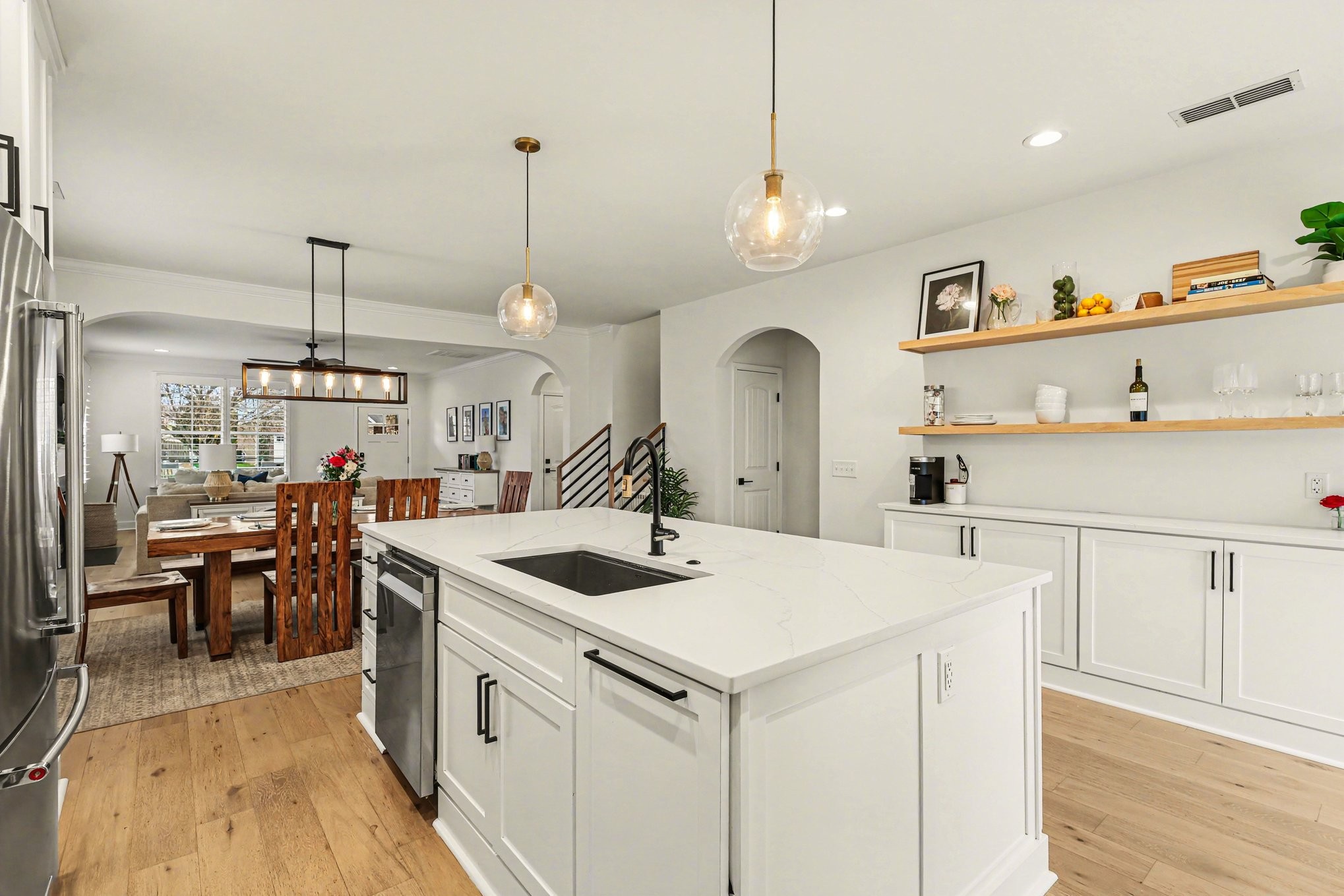 744 Bench Lane Mount Juliet, TN 37122 - Photo 10 of 27 a kitchen that has a lot of white cabinets and wooden floor