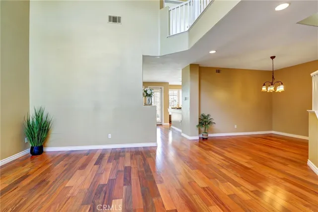 a view of a livingroom with wooden floor