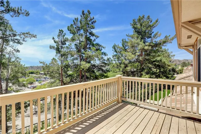 a view of a wooden roof deck