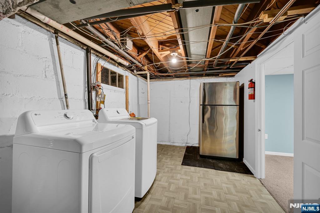 3 Country Club Road Livingston, NJ 07039 - Photo 34 of 37 a utility room with dryer and washer