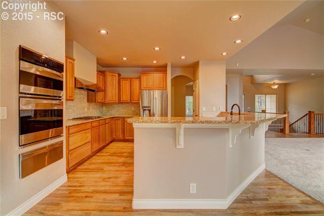 4241 High Forest Road Colorado Springs, CO 80908 - Photo 10 of 18 Double Oven, and Warming Drawer, Side by Side Refrigerator