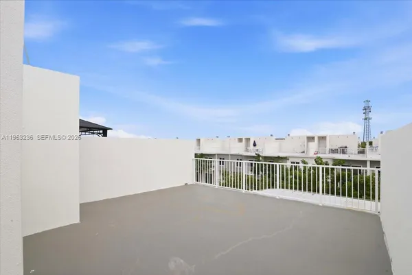 a view of a balcony with city view