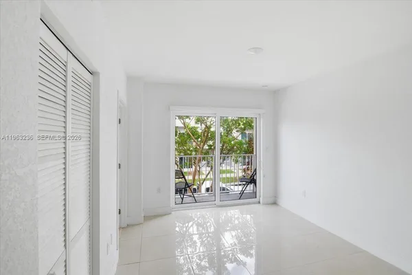 a view of a room that has a window in it