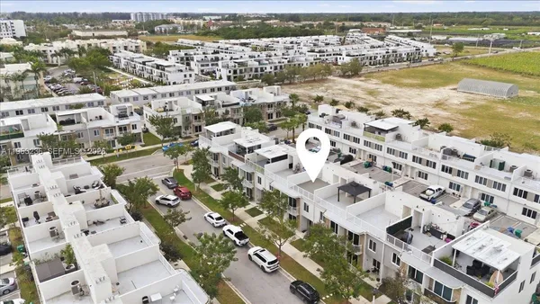 an aerial view of residential building with outdoor space