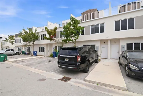 a car parked in front of a building