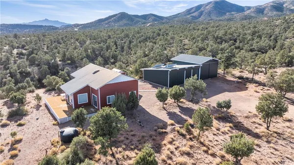 an aerial view of a house with a garden