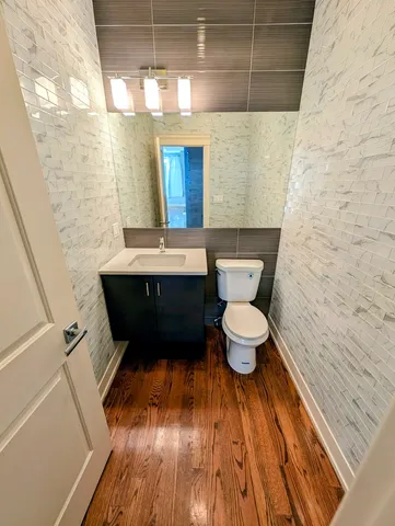 a bathroom with a toilet and a sink