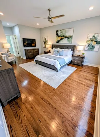 a living room with furniture fireplace and flat screen tv