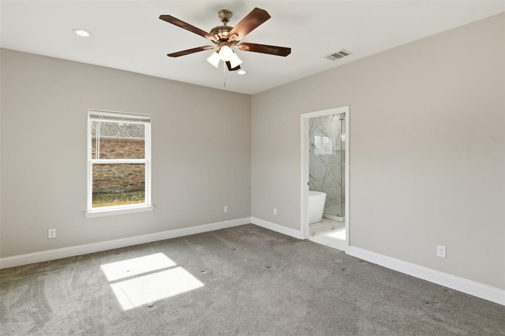 2204 Albert Broadfoot Street Bonham, TX 75418 - Photo 13 of 39 a view of an empty room with a window