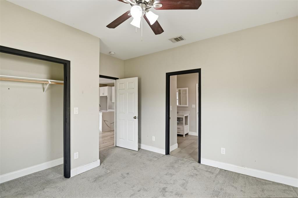 2204 Albert Broadfoot Street Bonham, TX 75418 - Photo 23 of 39 a view of an empty room and chandelier fan