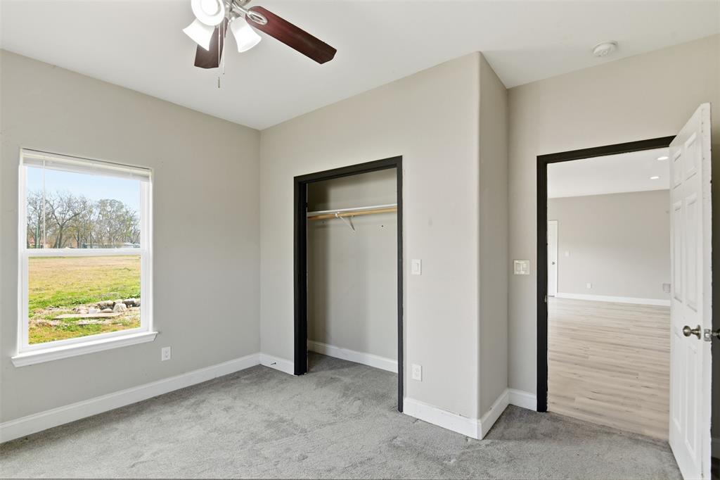2204 Albert Broadfoot Street Bonham, TX 75418 - Photo 24 of 39 a view of an empty room with a window