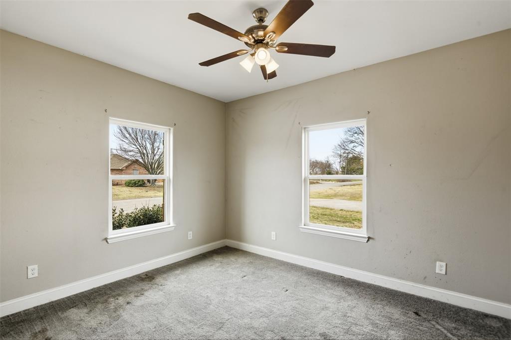 2204 Albert Broadfoot Street Bonham, TX 75418 - Photo 26 of 39 a view of an empty room with a window