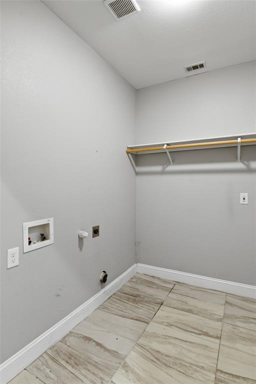 2204 Albert Broadfoot Street Bonham, TX 75418 - Photo 30 of 39 a view of a room with wooden floor