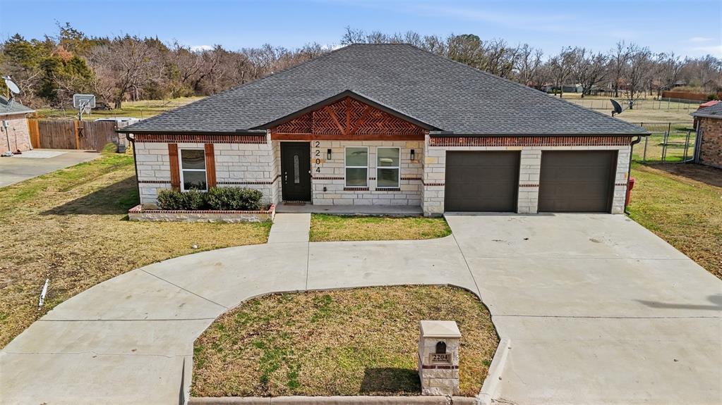 2204 Albert Broadfoot Street Bonham, TX 75418 - Photo 3 of 39 a view of a house with entertaining space
