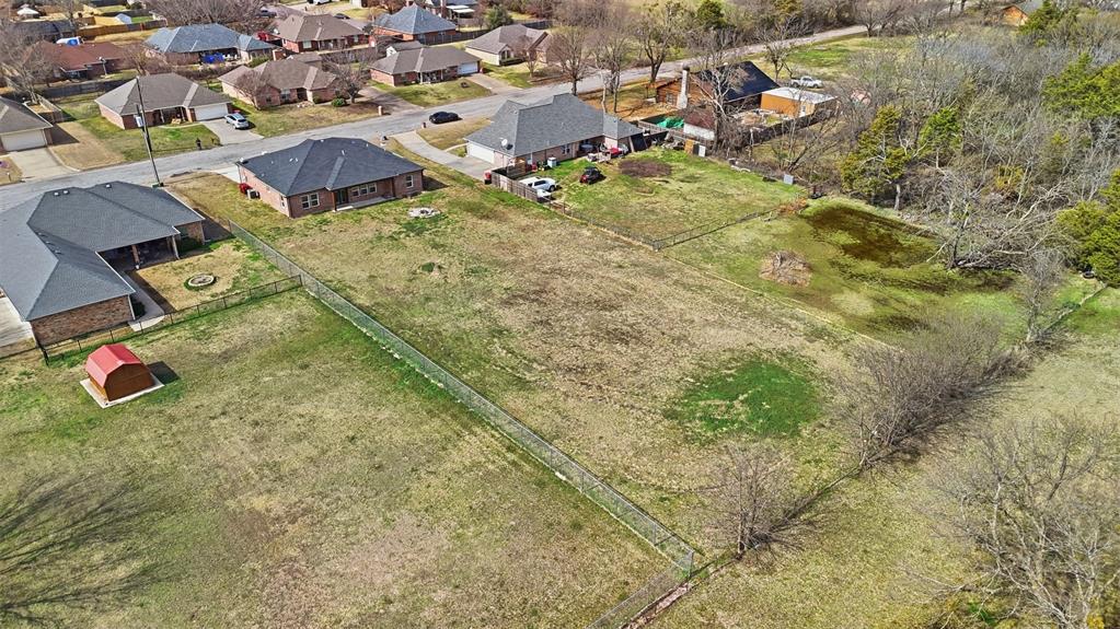 2204 Albert Broadfoot Street Bonham, TX 75418 - Photo 33 of 39 an aerial view of residential house with outdoor space
