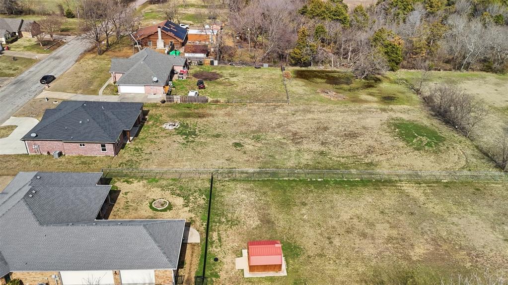 2204 Albert Broadfoot Street Bonham, TX 75418 - Photo 36 of 39 an aerial view of residential house with beach