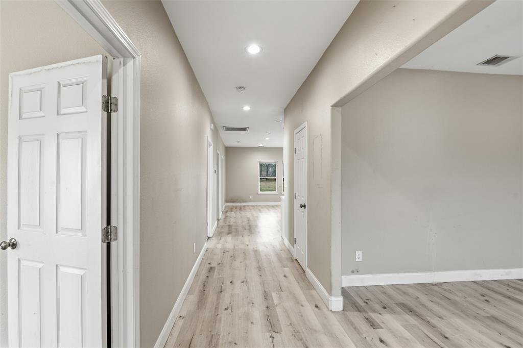 2204 Albert Broadfoot Street Bonham, TX 75418 - Photo 5 of 39 a view of hallway with wooden floor