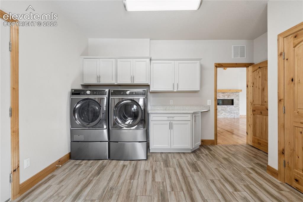 10840 Vollmer Road Colorado Springs, CO 80908 - Photo 29 of 49 a view of kitchen and wooden floor