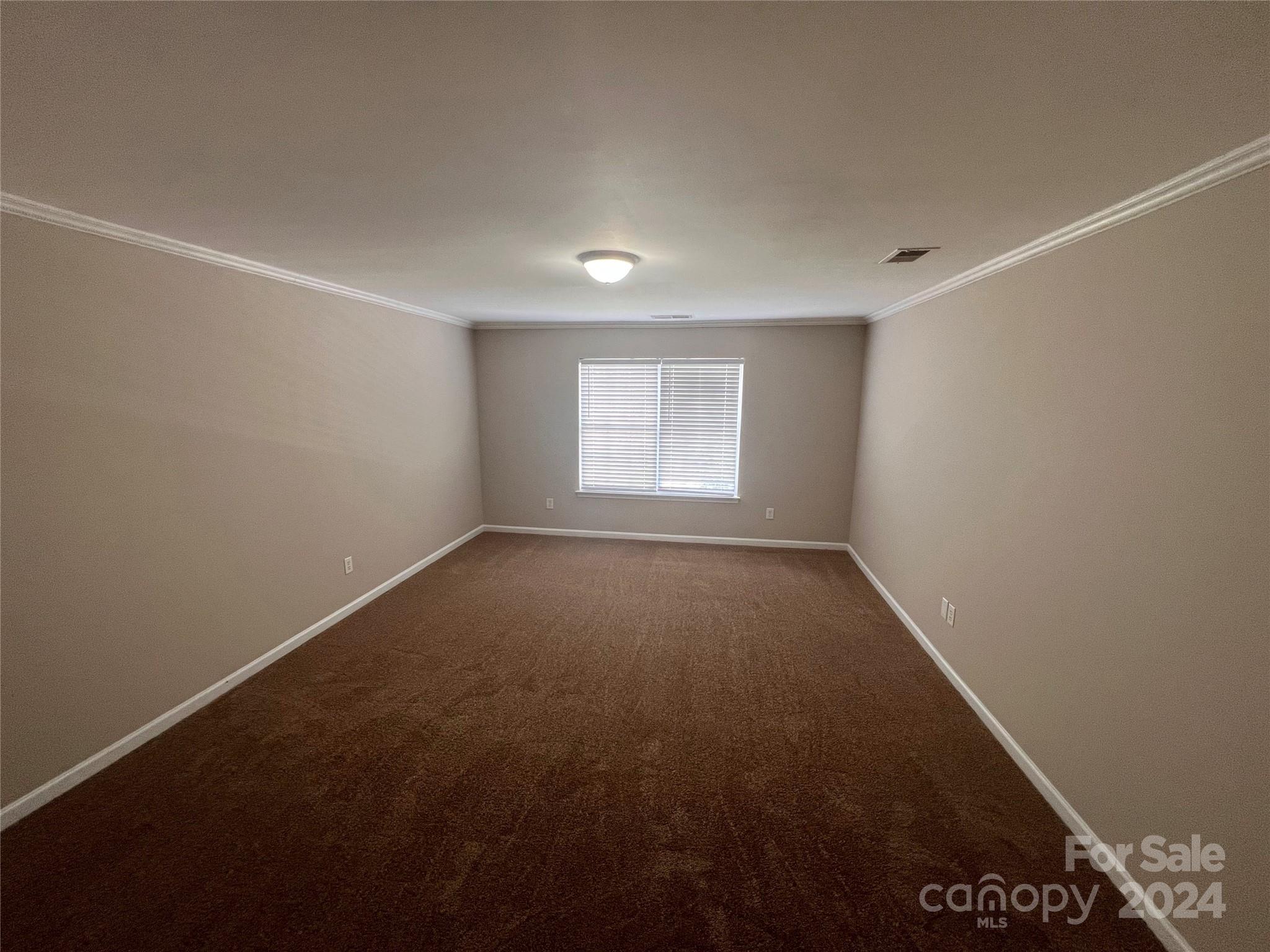 1022 Breakmaker Lane Indian Trail, NC 28079 - Photo 12 of 20 an empty room with a window