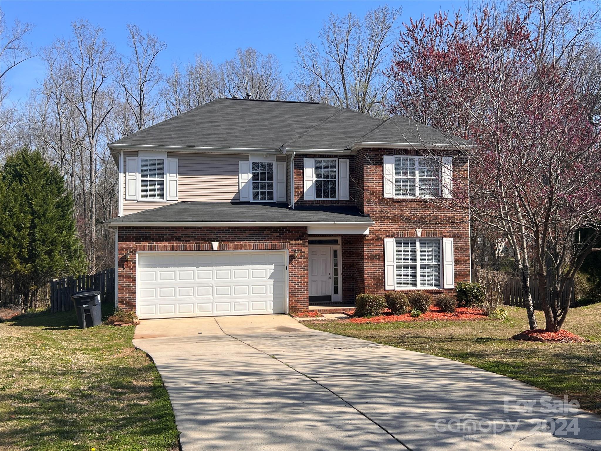1022 Breakmaker Lane Indian Trail, NC 28079 - Photo 20 of 20 a front view of a house with a yard