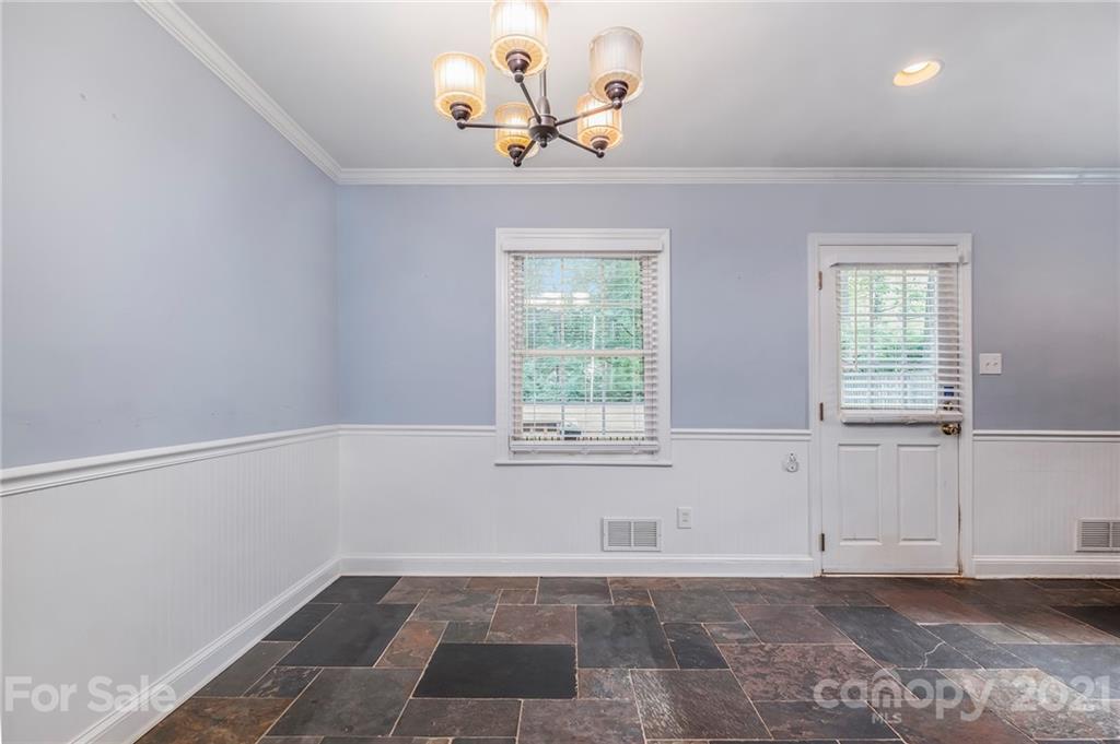 4211 Murrayhill Road Charlotte, NC 28209 - Photo 11 of 18 a view of an empty room with a window