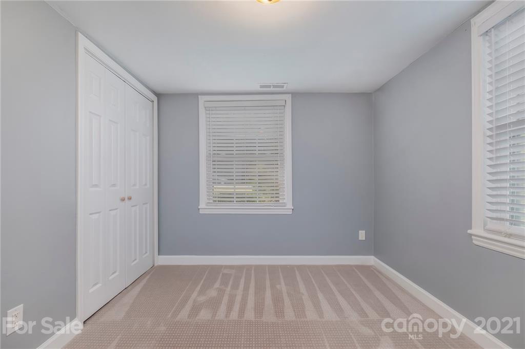 4211 Murrayhill Road Charlotte, NC 28209 - Photo 14 of 18 a view of an empty room with a window